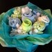 For retrop52------Turquoise Baby Clothes Bouquet