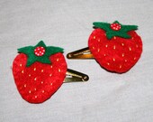 pair of strawberry hair clips