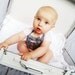 Vintage inspired Baby Onsie with attached gray vest and bow tie- red buttons white onesie