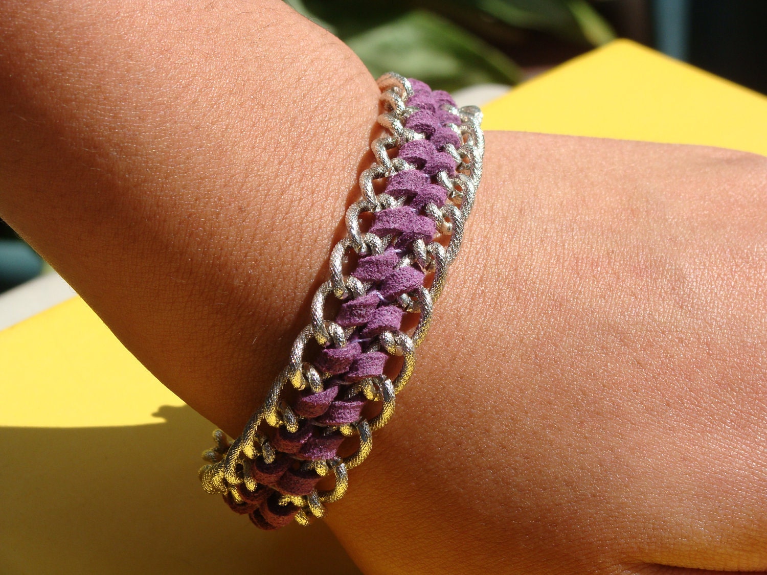 Leather like cord and chain braided bracelet, silver and purple.