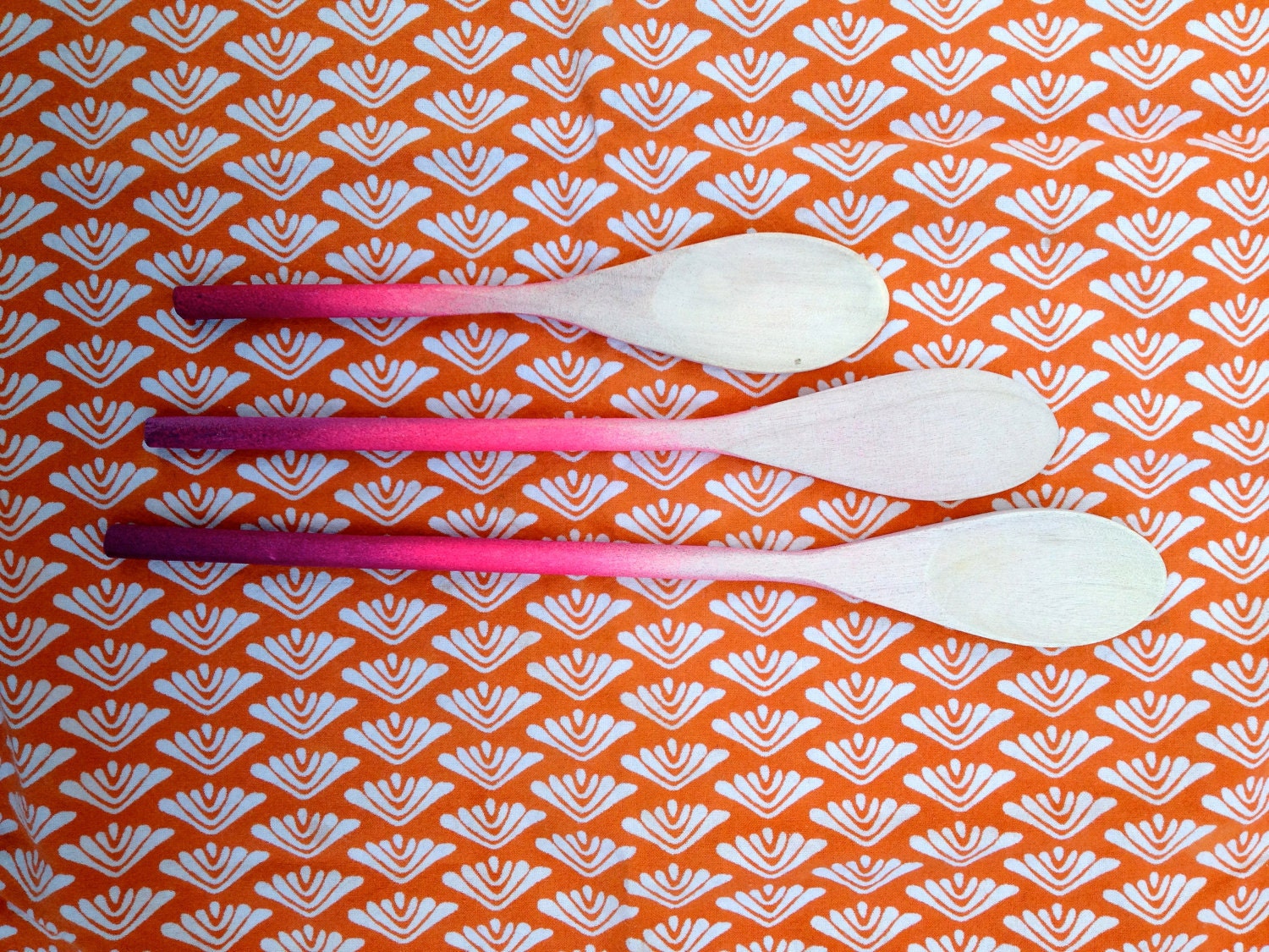Set of three wooden ombre spoons in pinky purples