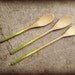 Set of four green ombre wooden spoons