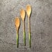 Set of four green ombre wooden spoons