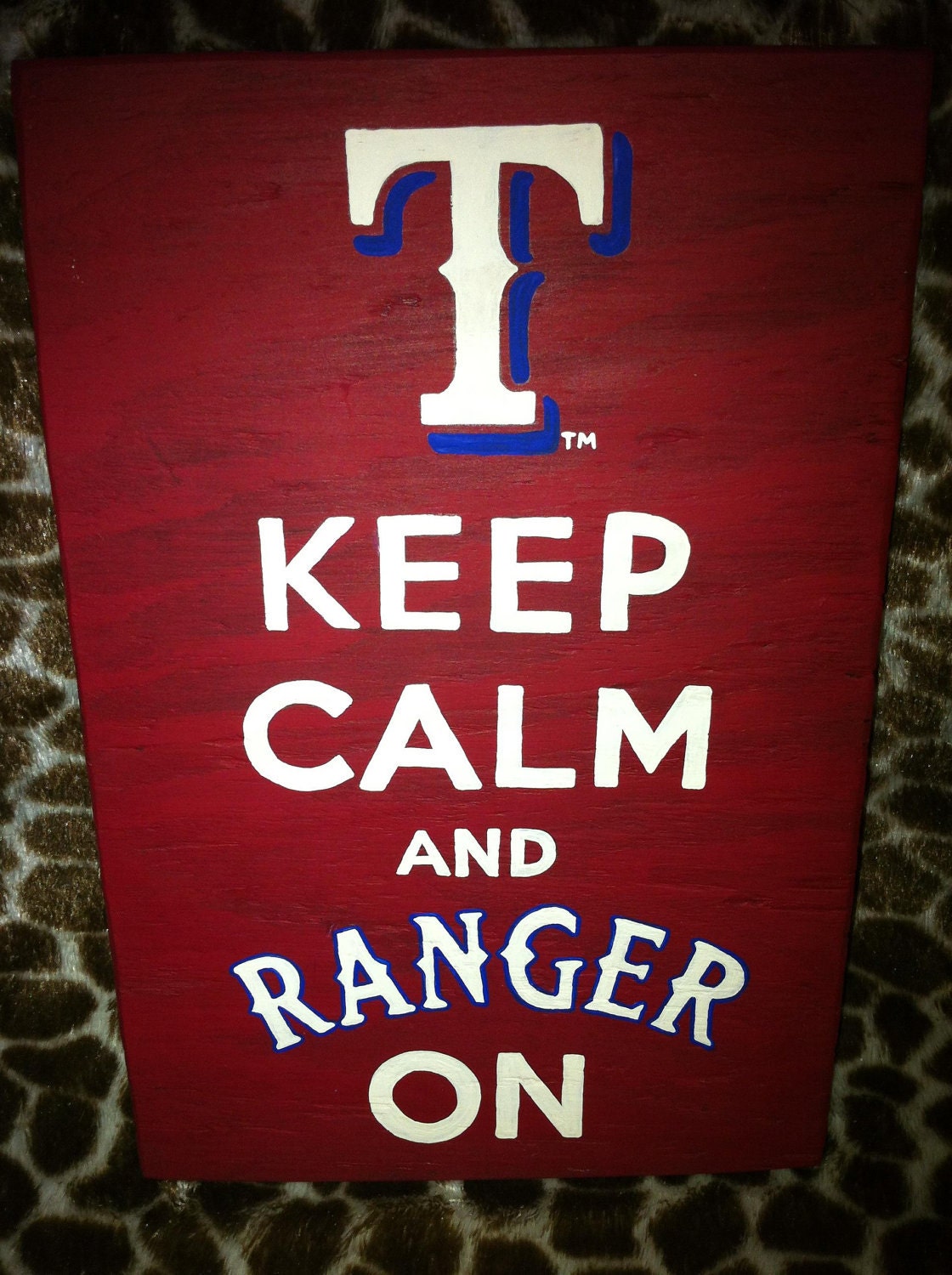 Hand painted "Keep Calm and Ranger On" wooden sign. Approx. 7x10.5"