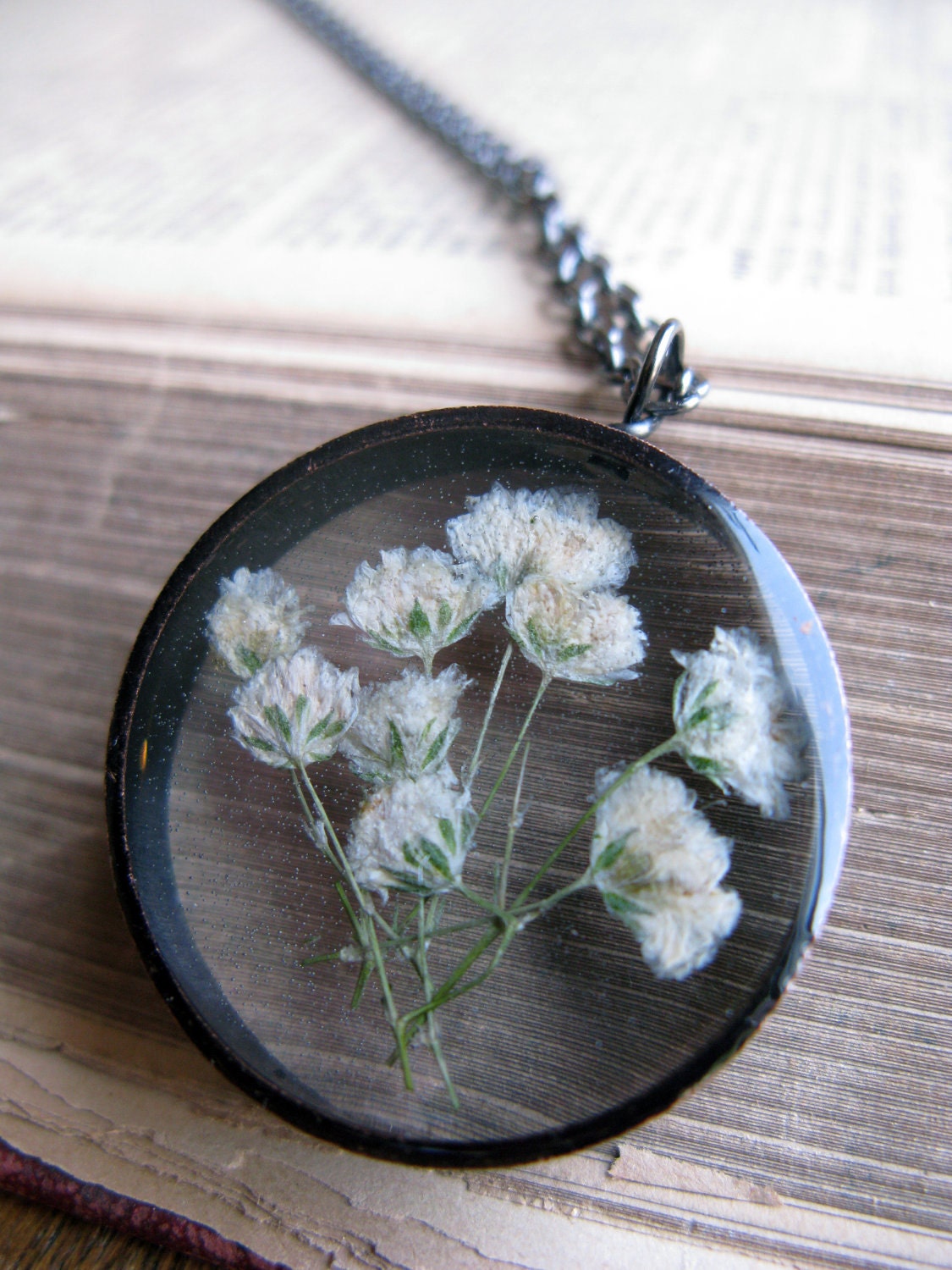 Beautiful Baby's Breath Pendant - real pressed baby's breath flowers encased in resin with clear copper bezel