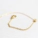 tiny skull bracelet - matt 14k gold plated skull on gold chain