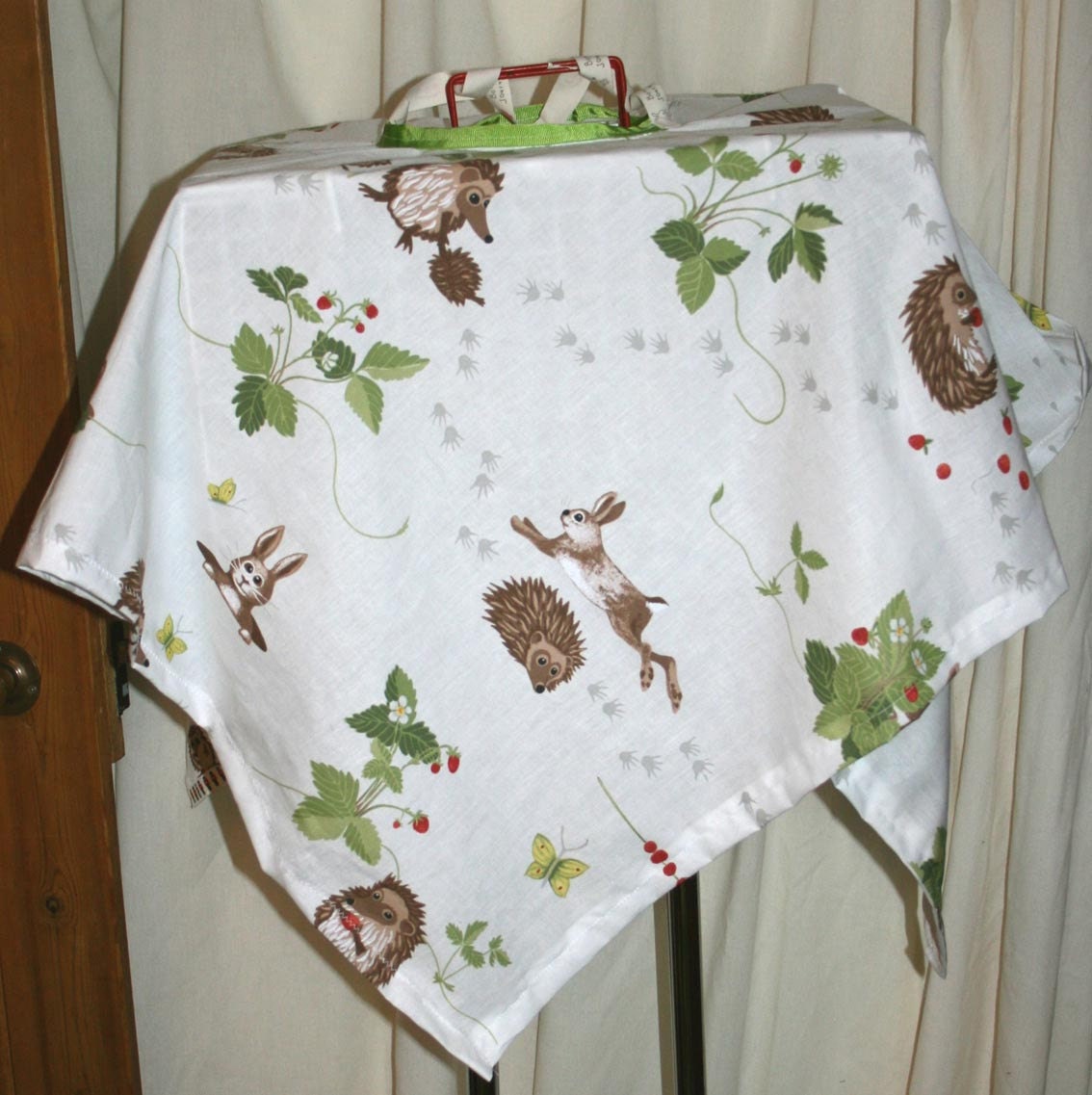 Bundercover carrier cover in cotton with bunnies and hedgehogs printed fabric