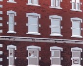 Eight-color linocut print of downtown Brattleboro, Vermont landmark, Mocha Joe's coffee shop, entitled "Mocha Morning"
