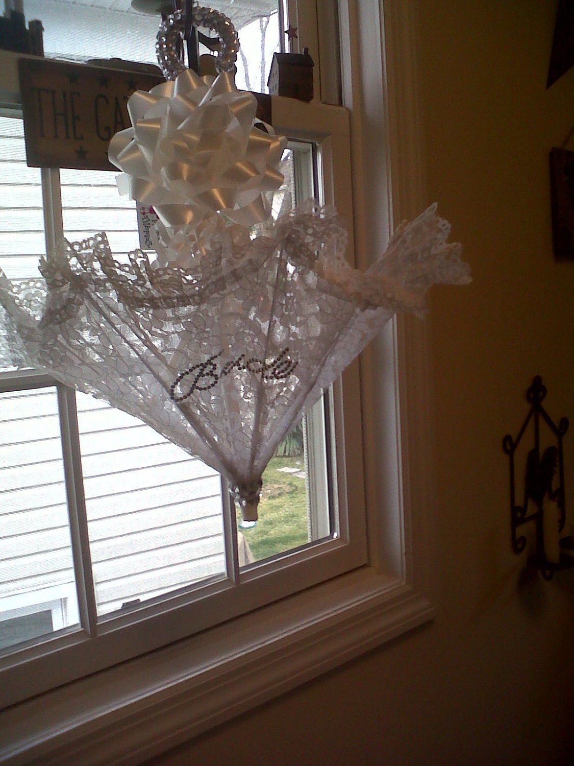 Custom made Blinged out bridal shower umbrellas by SweetBlingXOXO