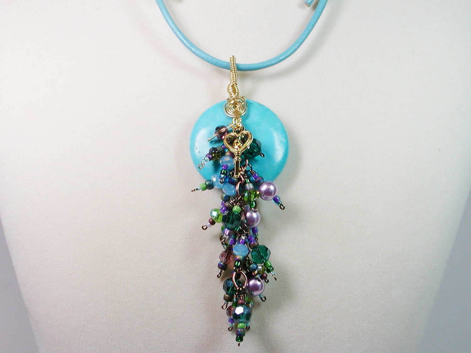 Wire Wrapped Turquoise Donut with Crystals and Key