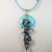 Wire Wrapped Turquoise Donut with Crystals and Key
