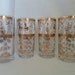Vintage Mid Century Modery Set of Four Greek Figure Bar Glass Barware Greacian Roman Figures Gold White Highball