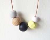 Geometric Clay Necklace with Faceted Bead