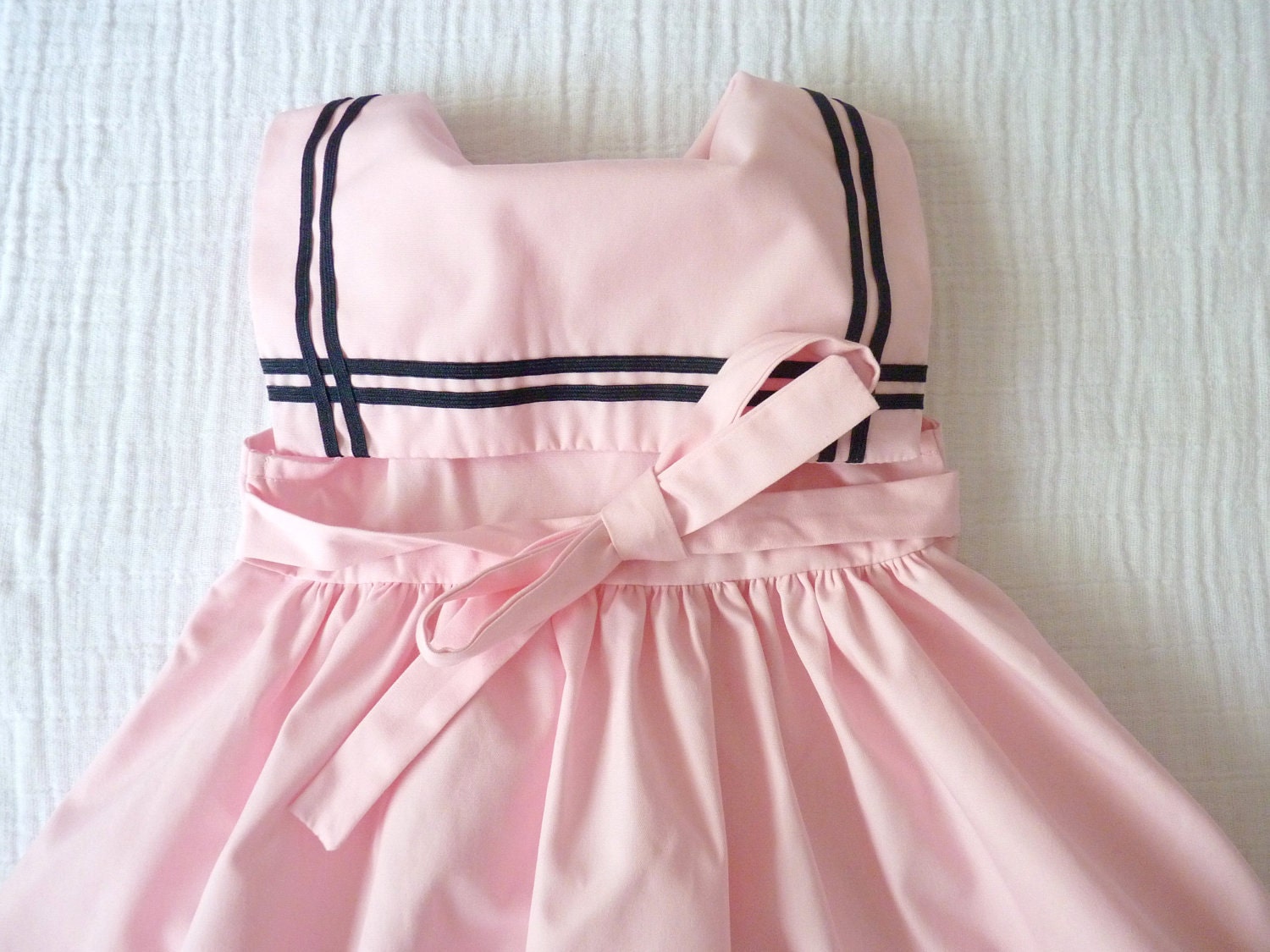 Pink and black baby sailor nautical dress, 12 months. Sleeveless, empire-waist, square sailor collar and a little black bow