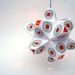 Paper Origami Lamp. White Multicolor Print with Red and Aqua Interior. 48 sides. (Polyhdra Luminaria Series)