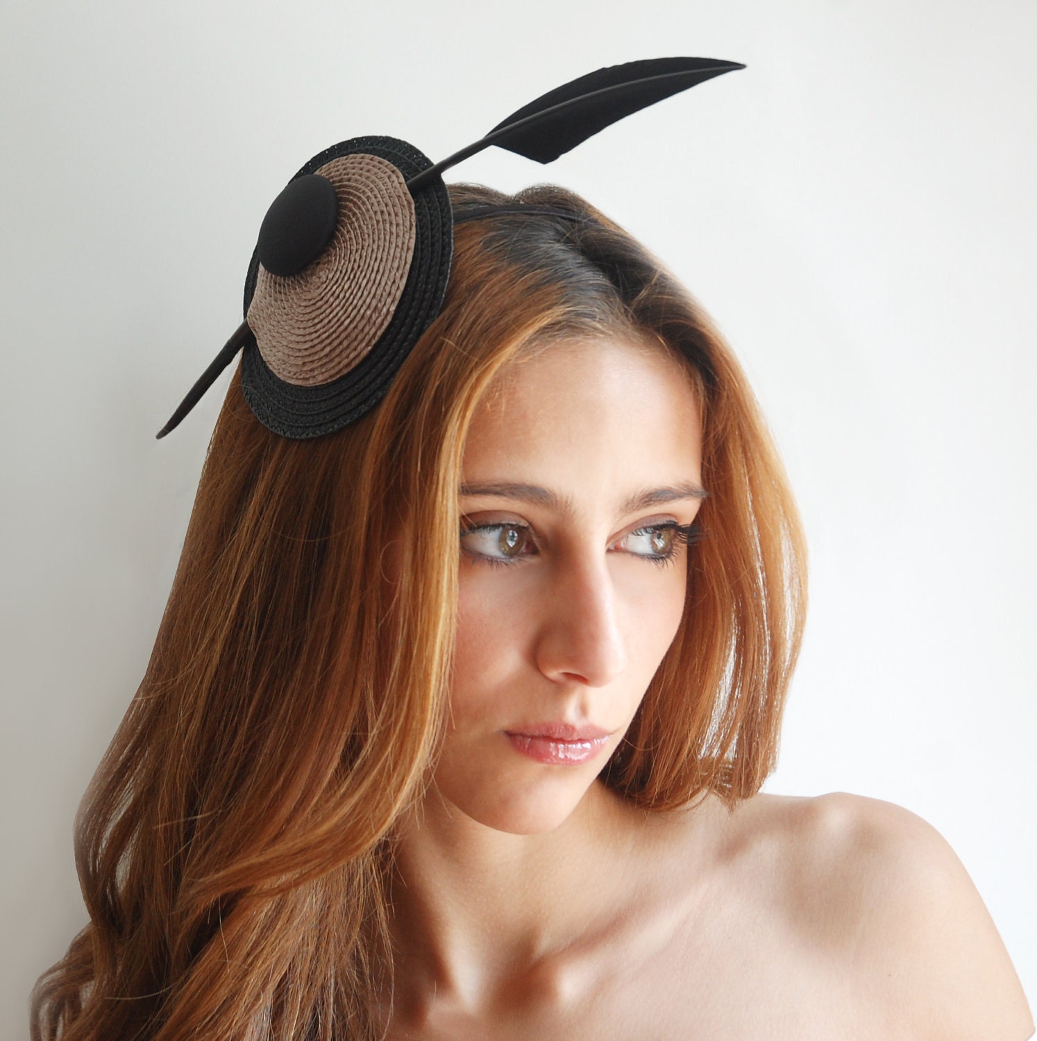 black  straw fascinator with arrowhead quill for women