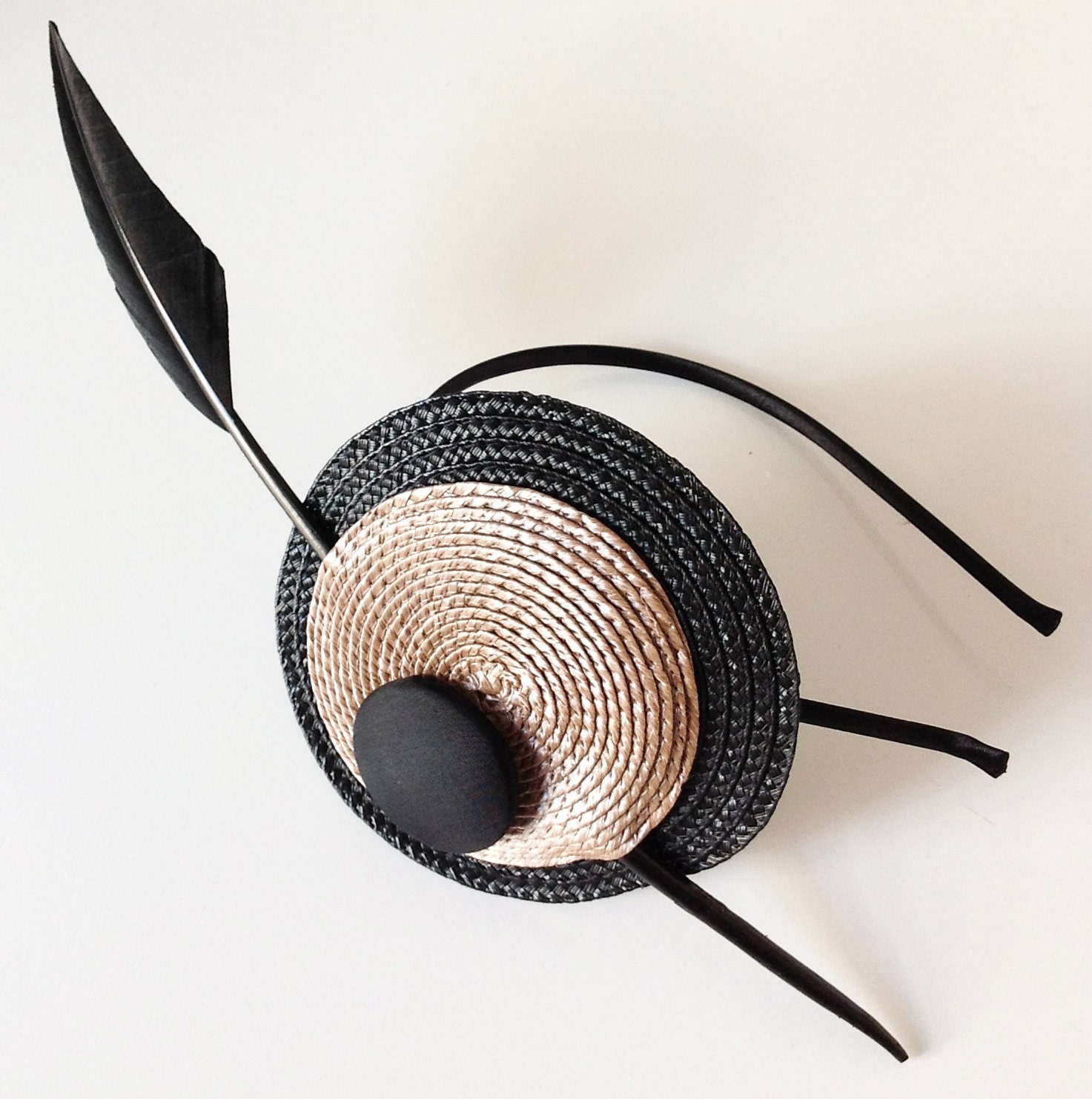 black  straw fascinator with arrowhead quill for women