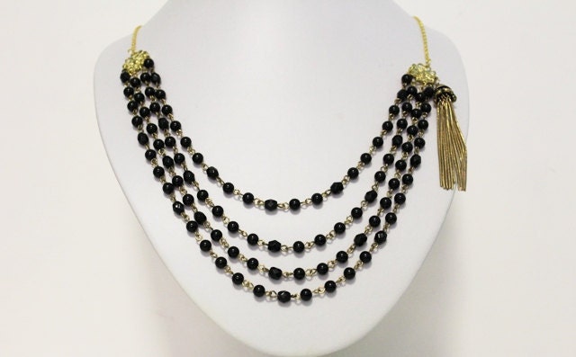 Handmade Recycled black and gold statement necklace with tassel detail