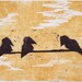 Black birds on a wire against a yellow background