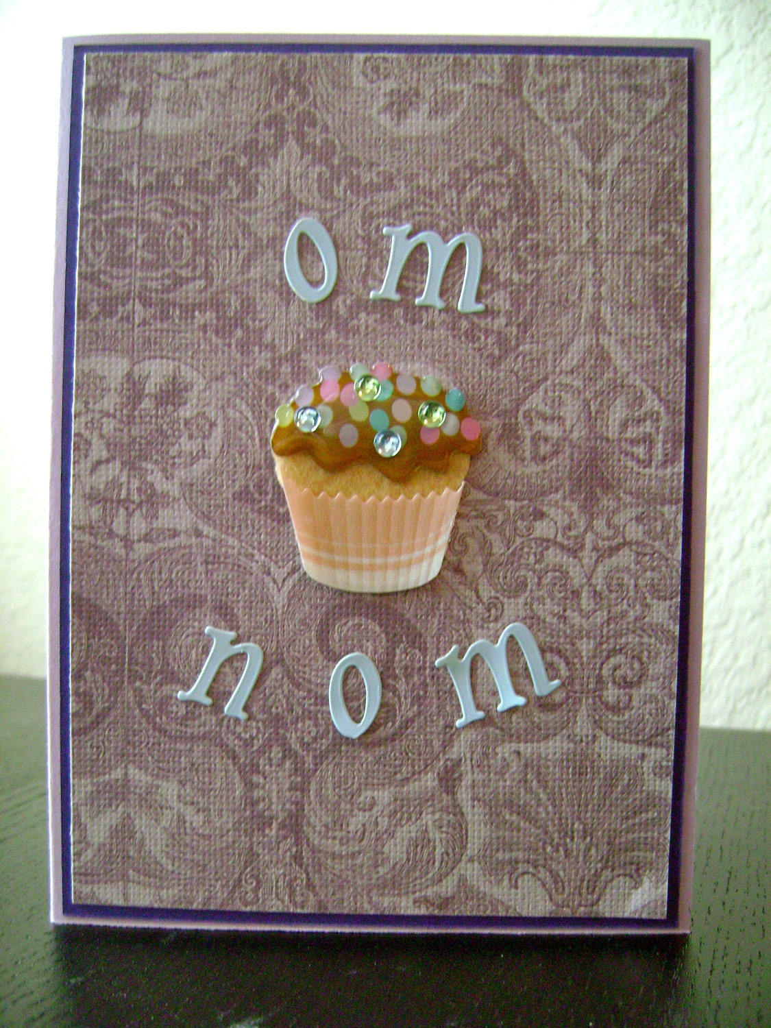 Om Nom Purple Cupcake Birthday Card