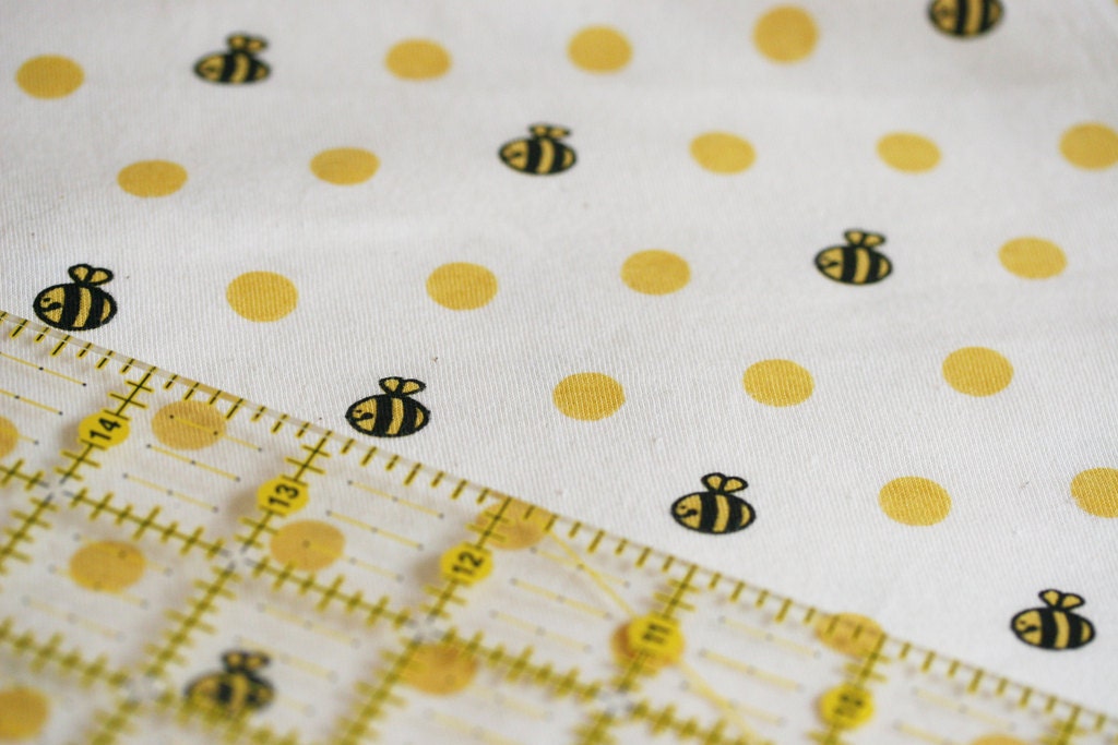 1.2 metres Organic Cotton Jersey Fabric in Bees and Yellow Polkadots