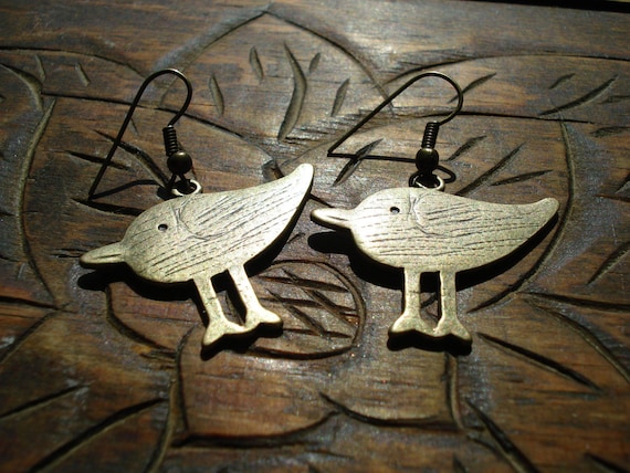 Antiqued gold tone bird earrings