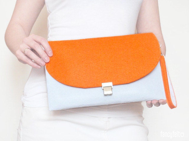 White and orange felt clutch
