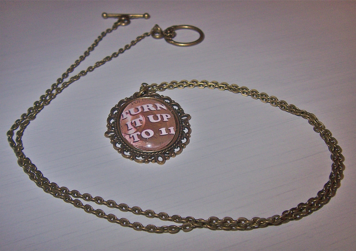 Turn It Up To 11 Spinal Tap necklace