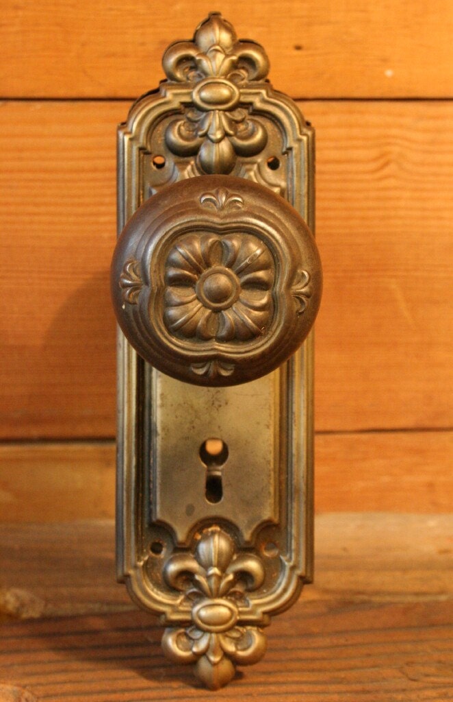 Antique Cast Iron Doorknob Set With Two Backplates - Floral Design in Center