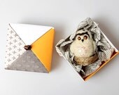 Small owl made from wool decorated with beads and wood