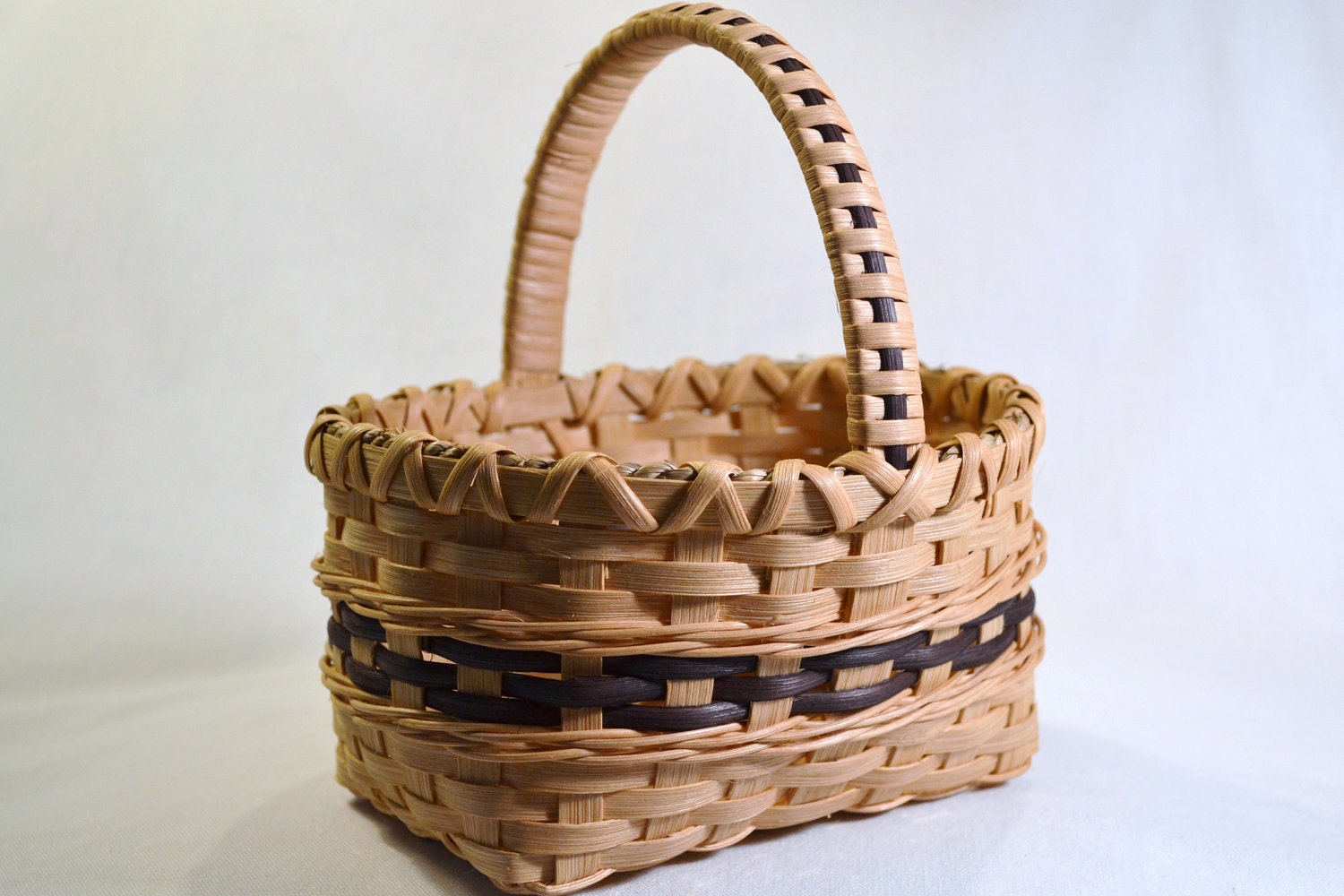 Small Handmade Reed or Wicker Basket with Black Accent for Flower Girl, Bath, or Table