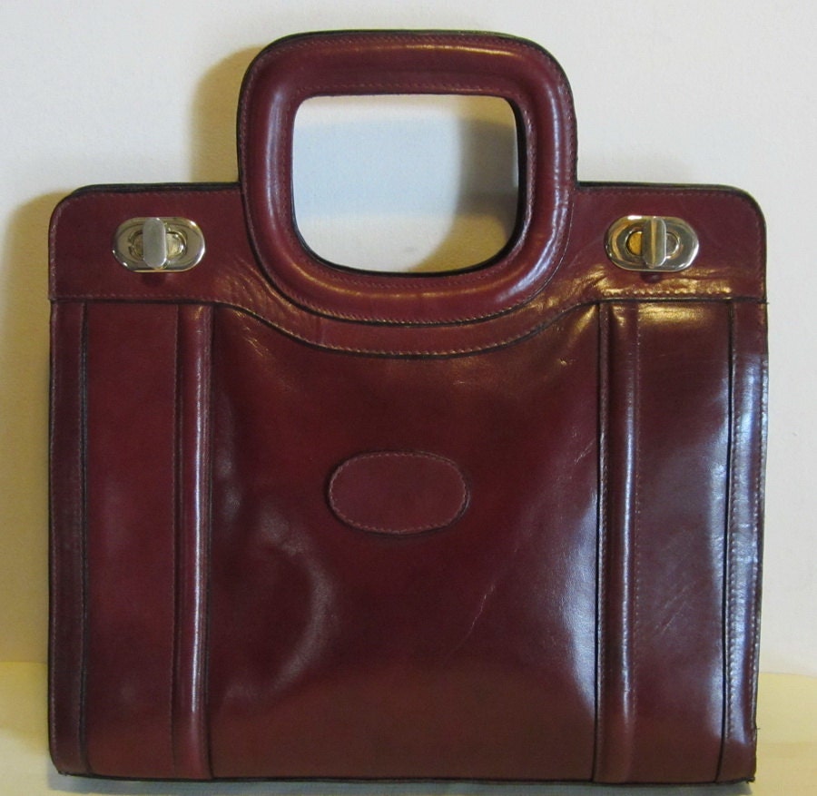 Great vintage burgundy leather bag with short handles,seventies
