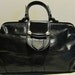 Fabulous vintage doctor's bag in black leather, Italy