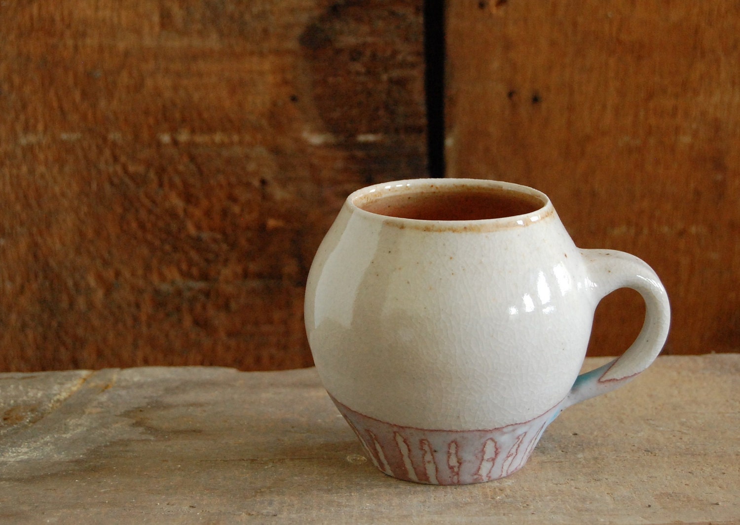 the perfect white and turquoise egg- shaped mug