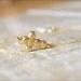 Gold Sideways Cross Bracelet