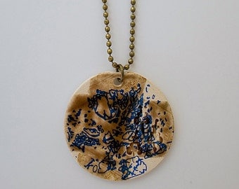 Brown and blue pendant. White stoneware necklace.