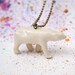 Polar bear pendant. White porcelain necklace.