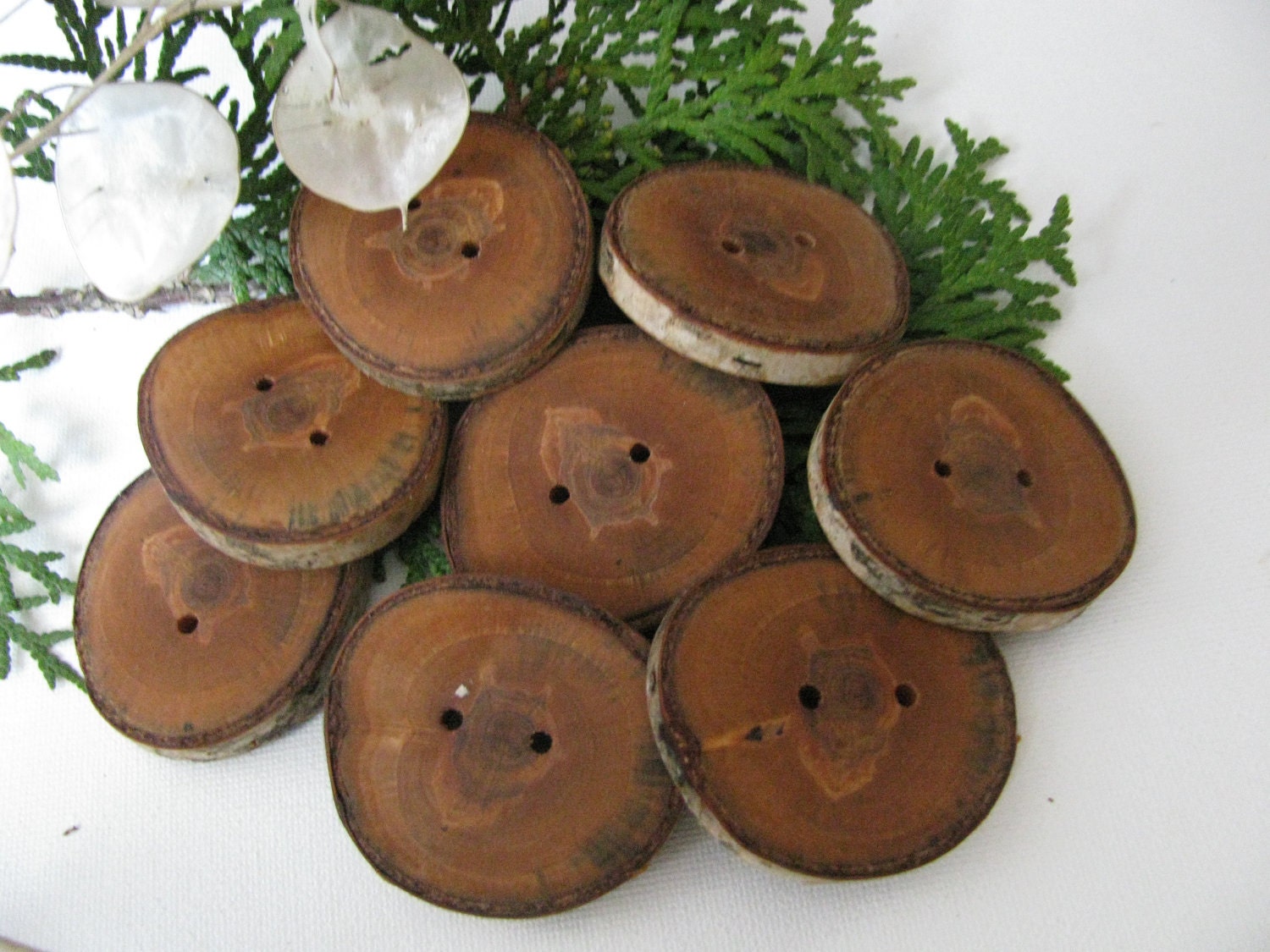 Eight wood buttons made from spalted birch in British Columbia, Canada. 2" round. Scarves, cowls or just about any fibre art project.