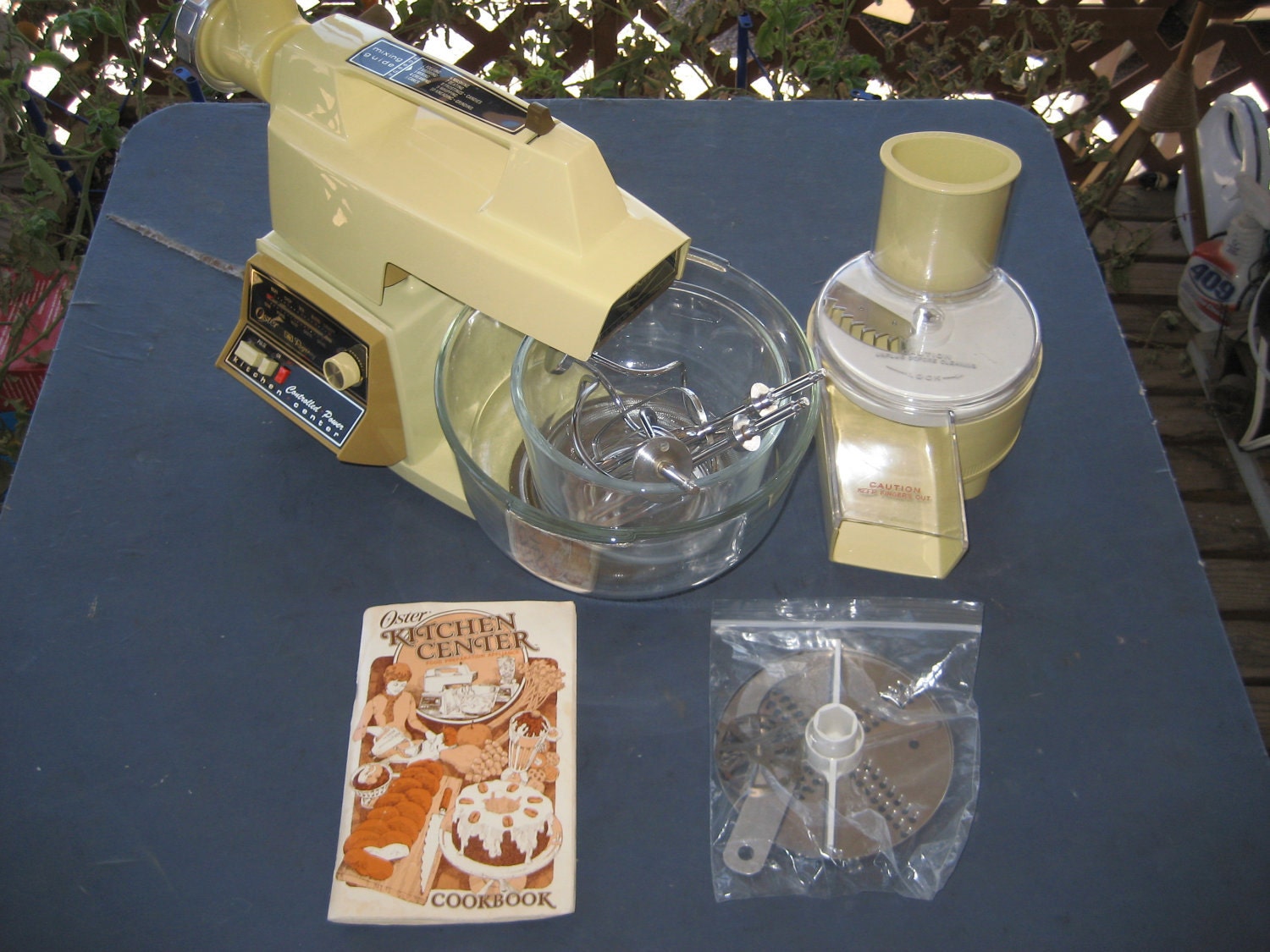 Vintage Oster Kitchen Center With Mixer, Slicer, And Meat Grinder Attachments.