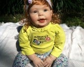 Reborn girl, larger baby