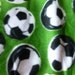 Fabric Sale - Soccer Balls on Green Fleece