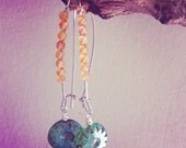 wire wrapped with carnelian with   czech glass fire polished green   beads
