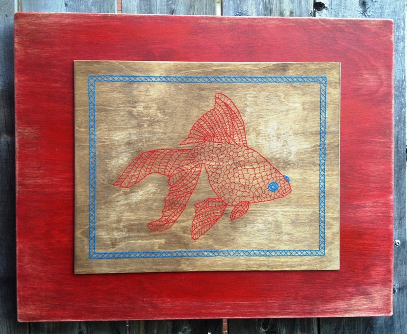 Coy Fish wood embroidery