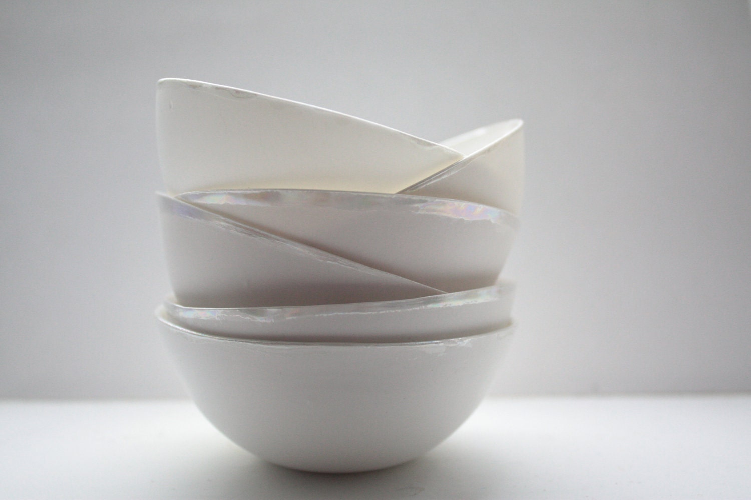 Stoneware English fine bone china vessel with mother of pearl luster.