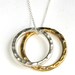 Sterling Silver and Gold Hammered Circle Necklace