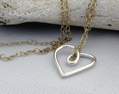 tiny silver heart on gold fill chain. handmade necklace by VisionQuest