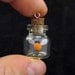 Orange Glow in the Dark Fairy Bottle Pendant