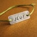 Star Wars Bracelet- Jedi stamped slide knot bracelet on cotton cord