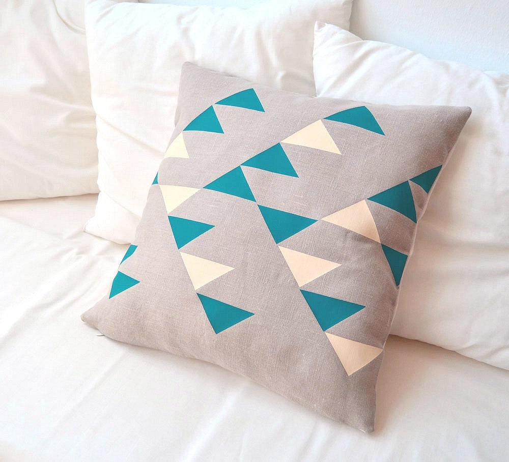 Natural beige linen pillow cover with geometric design inspired by tribal patterns