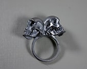one of us. conjoined twin skull ring. sterling silver.